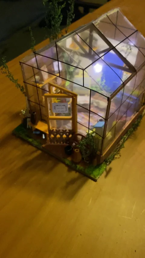 Vertical video of fake miniature garden craft model home Video stock 221379341