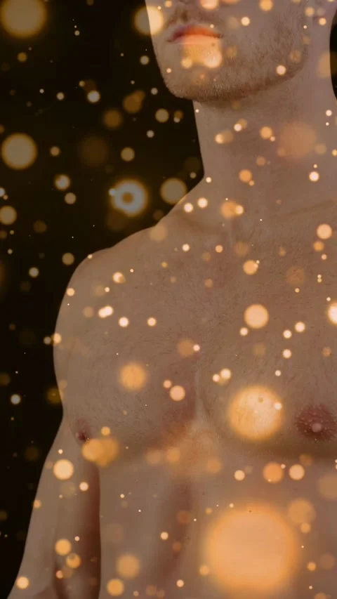 Vertical video: Fashion model posing, camera panning down showing torso, gold Stock Footage 334046670