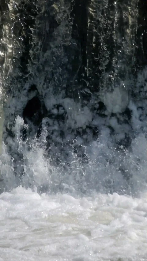 Vertical video of a fast flowing mountain river waterfall Stock Footage 320979318