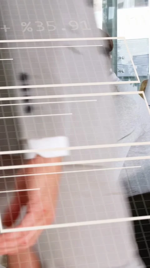 Vertical video: Female analyst tapping tablet in business office causing HUD Stock Footage 337540765