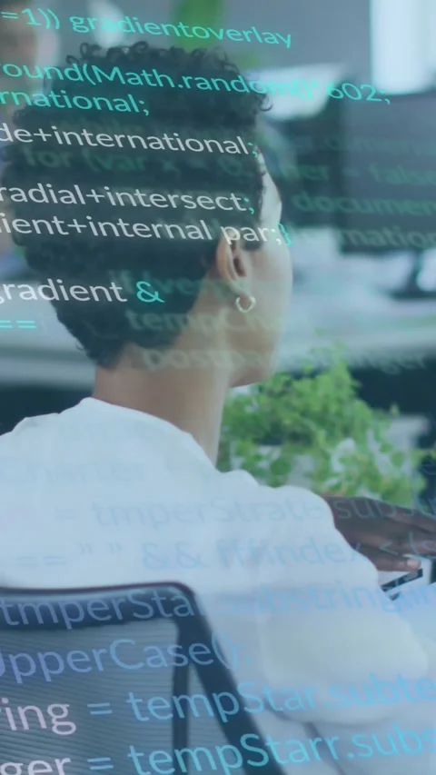Vertical video: Female dev following coworker pointing using keys teal code Stock Footage 334382330
