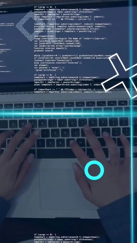Vertical video: Female dev typing on keyboard, activating cyan HUD overlays, Stock Footage 335355467