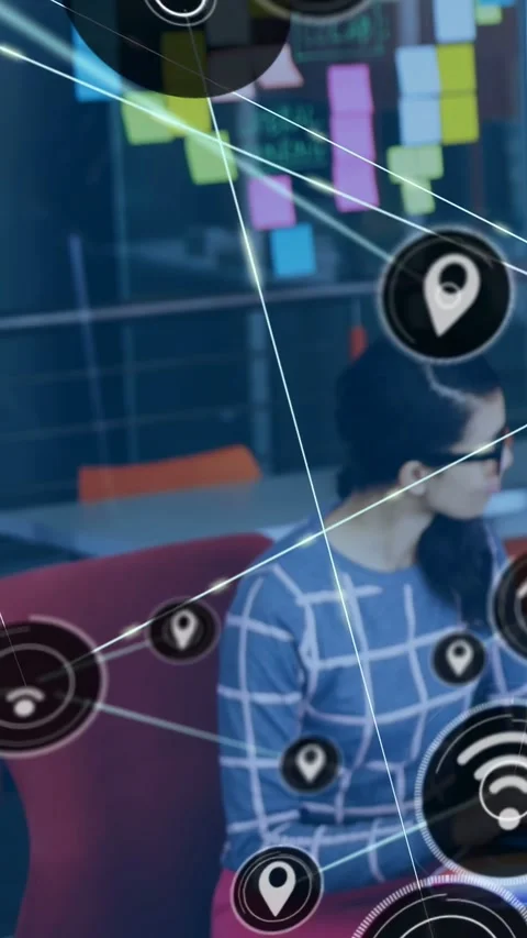 Vertical video: Female office worker typing laptop starting live nodes linking Stock Footage 333820917