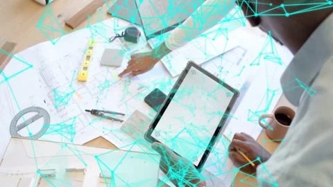 Vertical video: Female reaching plans man moving tablet aligning design with Stock Footage 333132460