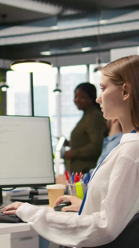 Vertical video Female technician testing generative AI machine learning Stock Footage 312709415