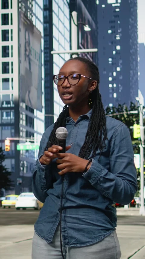 Vertical Video Filming news segment, street interviewer in city center, using 스톡 동영상 334198406