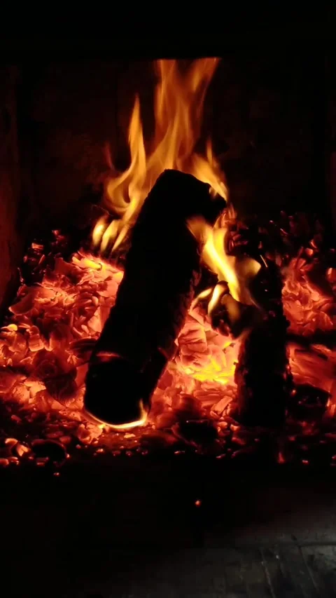 Vertical video. Fire in the fireplace with a festive atmosphere. Stock Footage 201341476