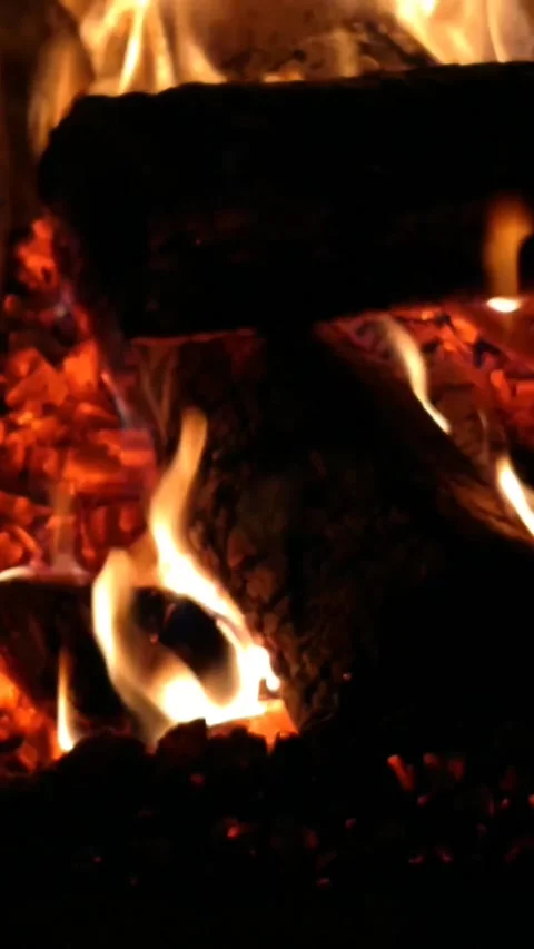 Vertical video of the fire in the stove Stock Footage 171882116