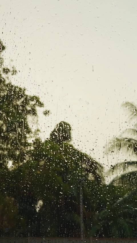 Vertical video. First Person View Through an Open Window Covered With Rain Drops Stock Footage 338188196