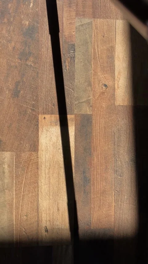 Vertical video of a flat microfiber mop cleaning a wooden floor with visible Stock Footage 318657754