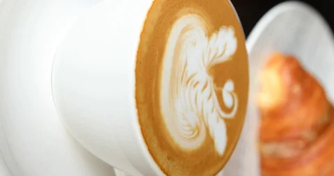 A  vertical video of a flat white coffee in 1920 Stock Footage 102931427