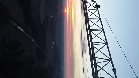 Vertical video. Flight of a crane boom on nature background. Stock-Footage 215085321