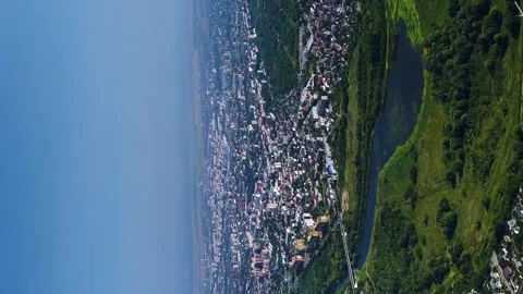 Vertical video. Flight over a Ukrainian city in the western part of Ukraine. Video stock 248956414