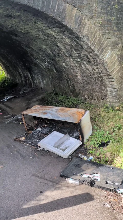 Vertical Video of Fly Tipped Illegally Dumped Garbage Waste Obstructing Pathway Vidéo 336617085