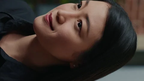 Vertical video Focused asian software developer writing programming code and Stock Footage 194148662