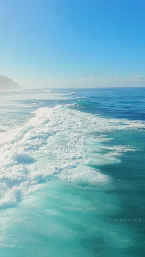 Vertical video. FPV Drone Chasing Wave Line at Nyang Nyang Beach, Fast Cinematic Stock Footage 336639107