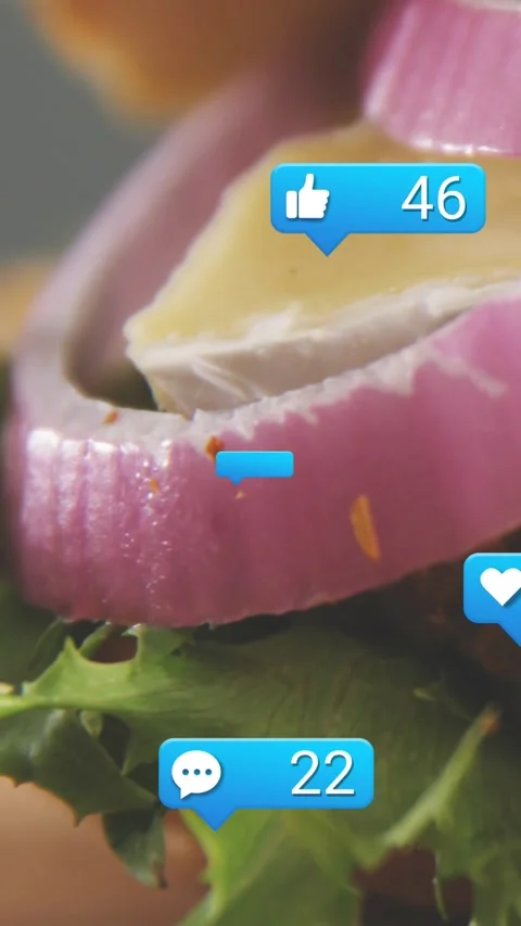 Vertical video: Frame panning up right starting burger revealing while bubbles Stock Footage 328398687
