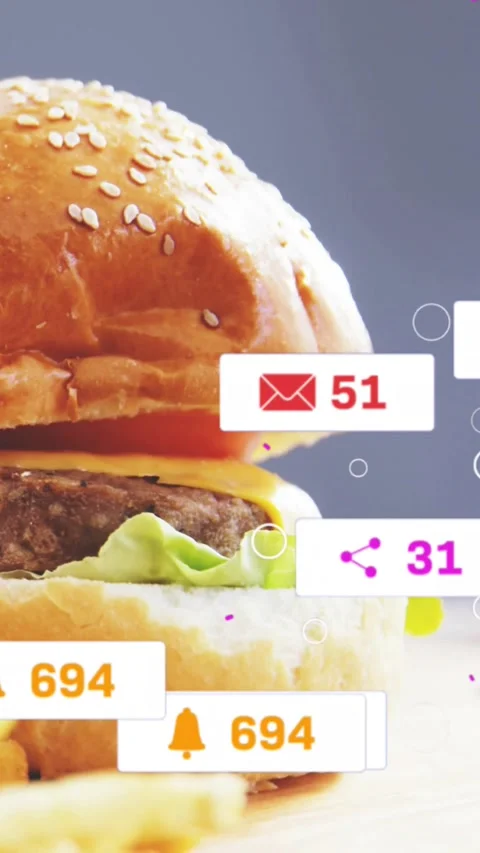 Vertical video: Frames revealing burger as social badges floating and updating Stock Footage 329128474