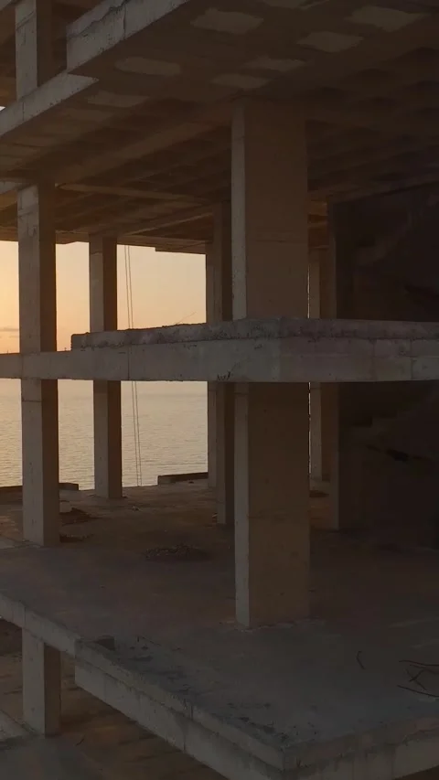 Vertical Video: Framework rises for an elite coastal residence under Stock Footage 297658756