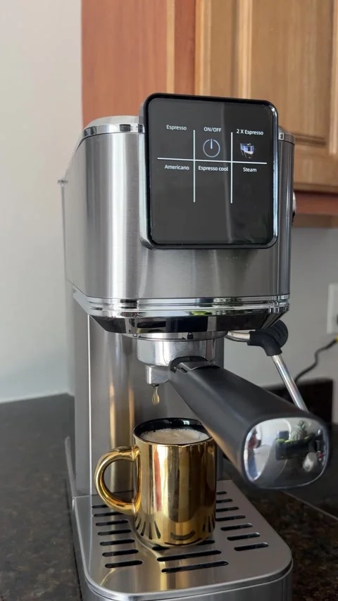Vertical video of freshly brewed coffee pouring from coffee machine Stock Footage 342061932