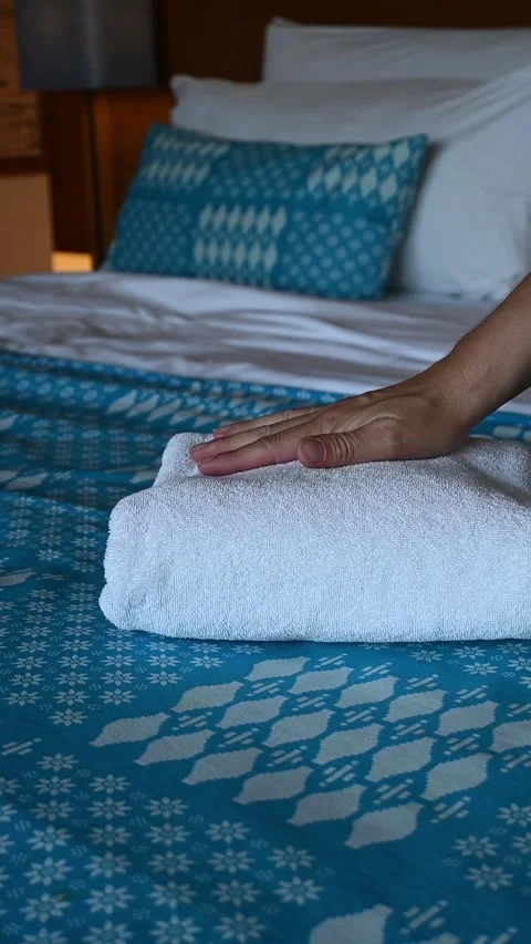 Vertical video of freshly washed and folded white towels are slowly and nea.. Stock Footage 318214934