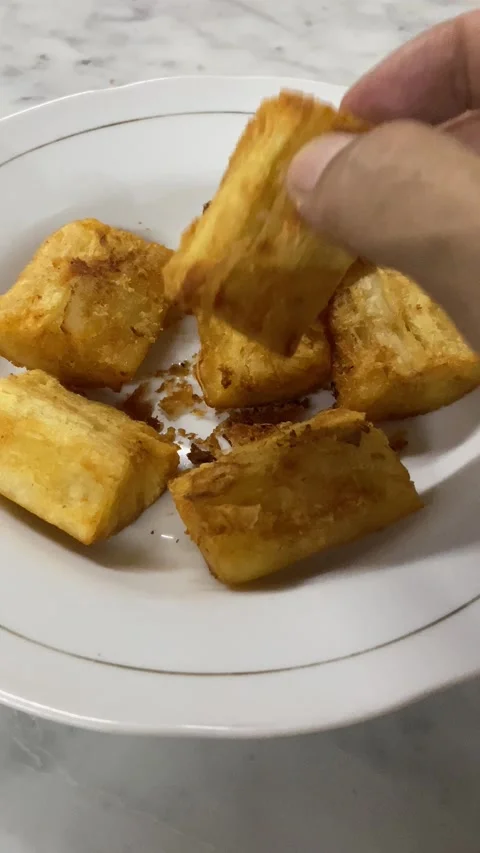 Vertical video of fried cassava Stock Footage 292868388