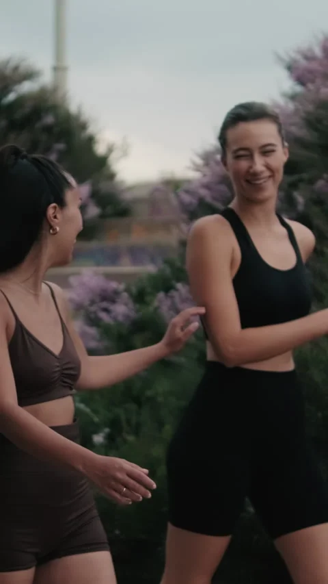 Vertical video, Friends Taking a Selfie After Ocean Workout Stock Footage 304280302