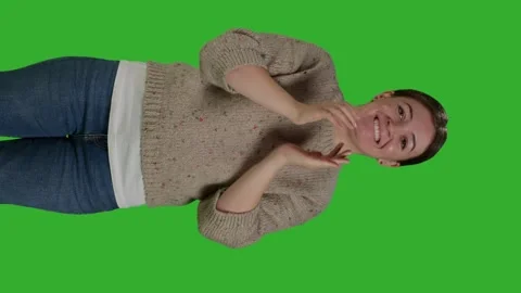 Vertical video: Front view of female person clapping hands and cheering people Stock Footage 227224586