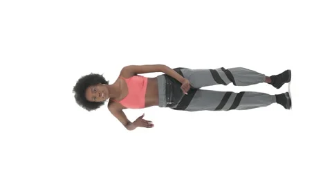 Vertical video. Full length front shot of African woman dancing hip hop. Street Stock Footage 141510734
