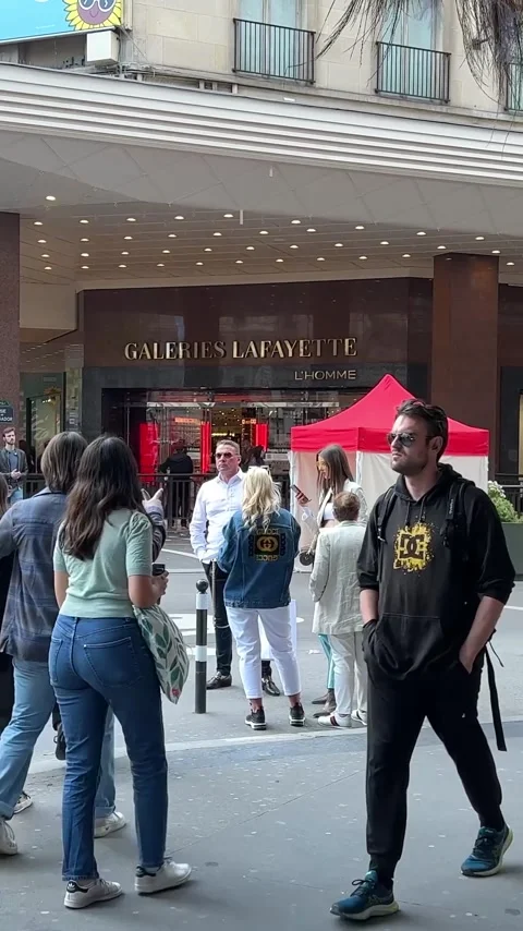 Vertical video Galeries Lafayette Brand store on the main street of Paris Stock Footage 244257569