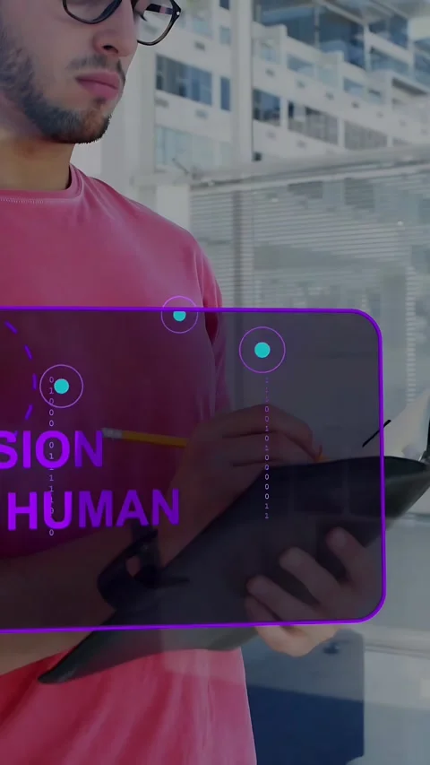 Vertical video: Gaze activating AR UI, man holding pad noting for inspection Stock Footage 335263887