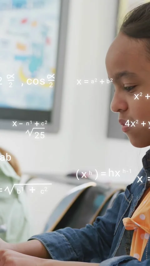 Vertical video: Girl studying tablet in class, tapping, writing, causing math Stock Footage 335264371