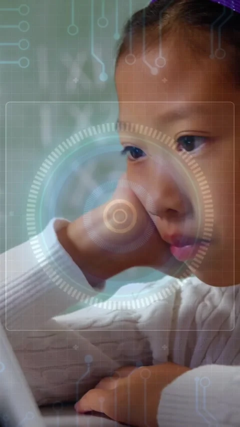 Vertical video: Girl tapping tablet on stand, resting chin watching HUD overlay Stock Footage 331271020
