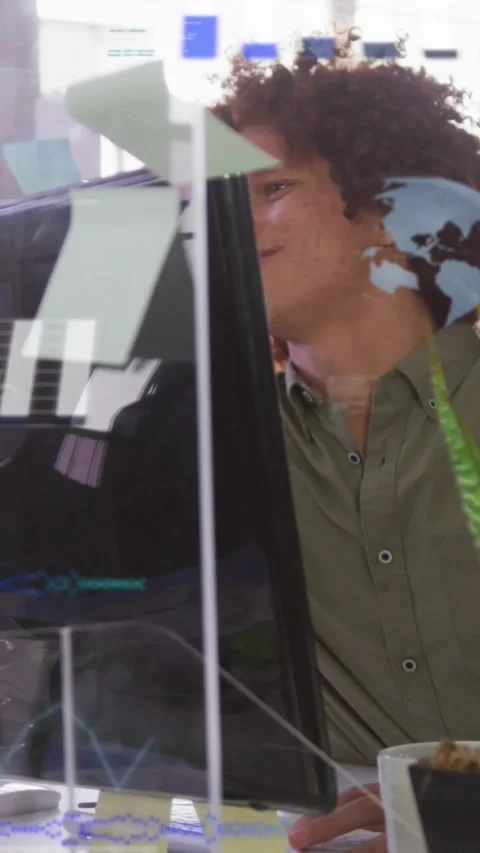 Vertical video: Glass reflection catching eye, person leaning toward monitor and Stock Footage 330189505