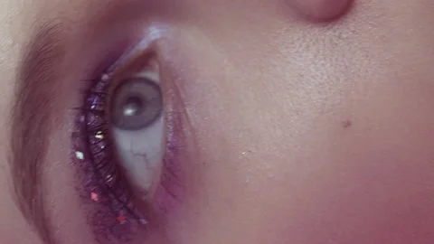 Vertical video glitter makeup beauty face woman Stock Footage 234480720