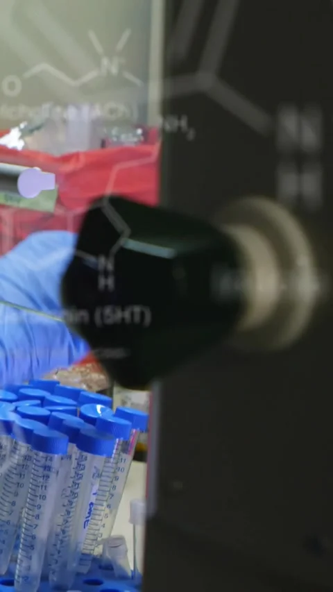 Vertical video: Gloved right hand starting reach as device knob shifts, Stockbeeldmateriaal 330919578