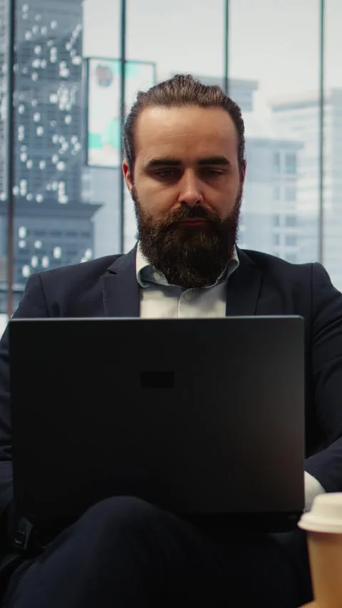 Vertical Video Goals oriented businessman focuses on his company and career Stock Footage 317409583