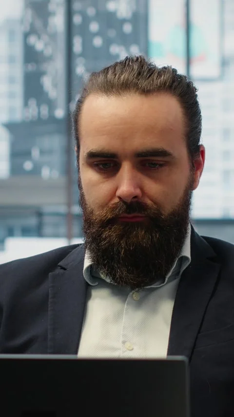 Vertical Video Goals oriented businessman focuses on his company and career Stock Footage 317409988