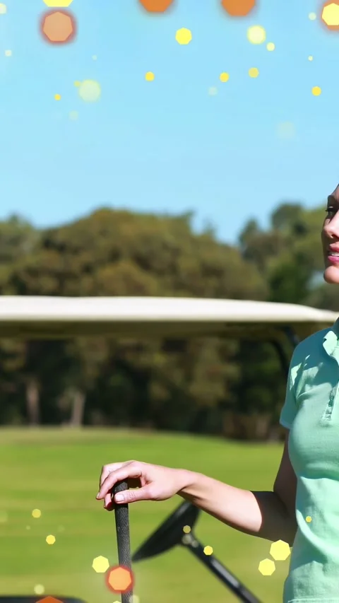 Vertical video: Golfer entering right, grabbing club, prepping swing with Stock Footage 333259752