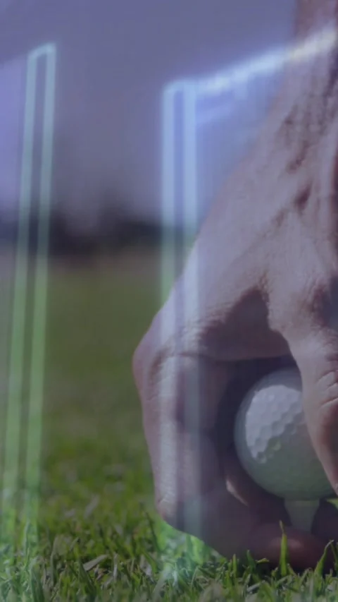 Vertical video: Golfer hand reaching, pressing tee and lowering golf ball amid Stock Footage 334187310