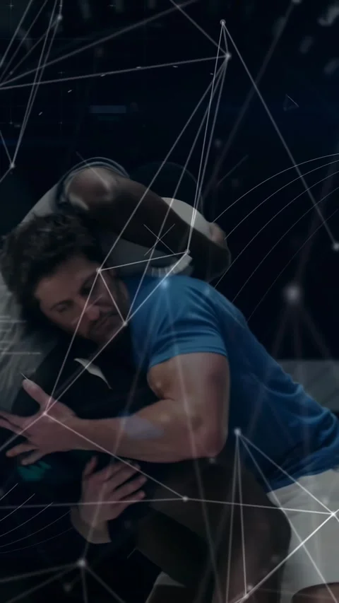 Vertical video: Gray starting pad contact, blue locking grip, lifting takedown Stock Footage 331009486