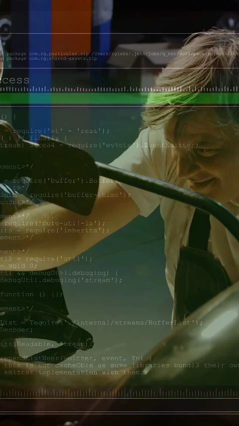 Vertical video: Green bar appearing, mechanic leaning over bike, adjusting front Stock Footage 334391443