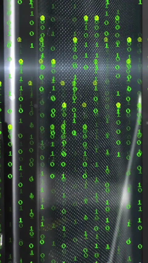 Vertical video: Green binary code cascading across metal grille, technology boot Stock Footage 331292018