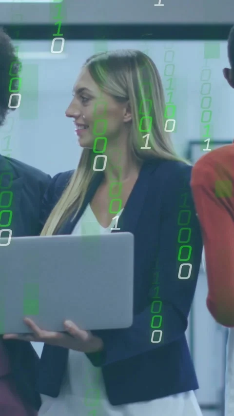 Vertical video: Green code appearing while presenter holding laptop and peer Stock Footage 334605155