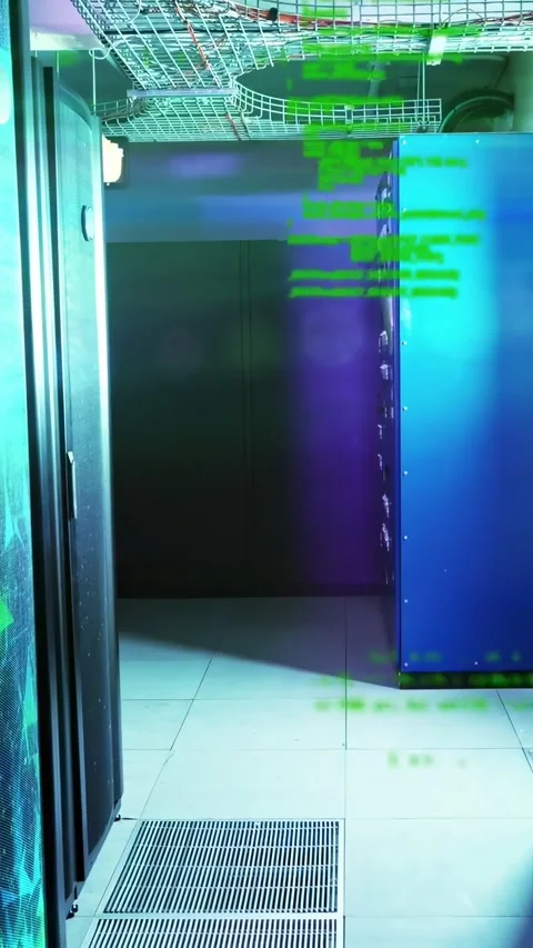 Vertical video: Green code overlay shifting, revealing server rack and blue Stock Footage 334382406