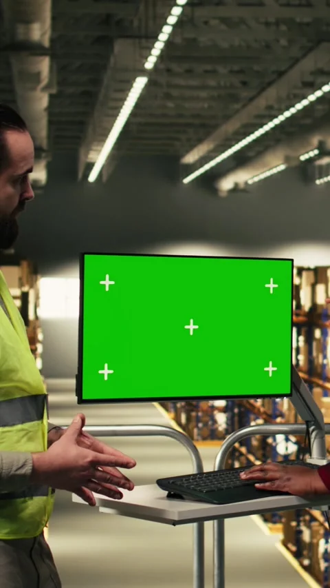 Vertical Video Green screen computer desktop, two workers team, distribution Stock Footage 330203627