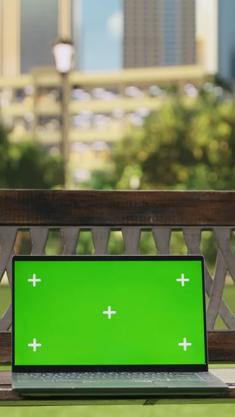 Vertical Video Green screen isolated mockup laptop on wooden bench placed in Stock Footage 344376016