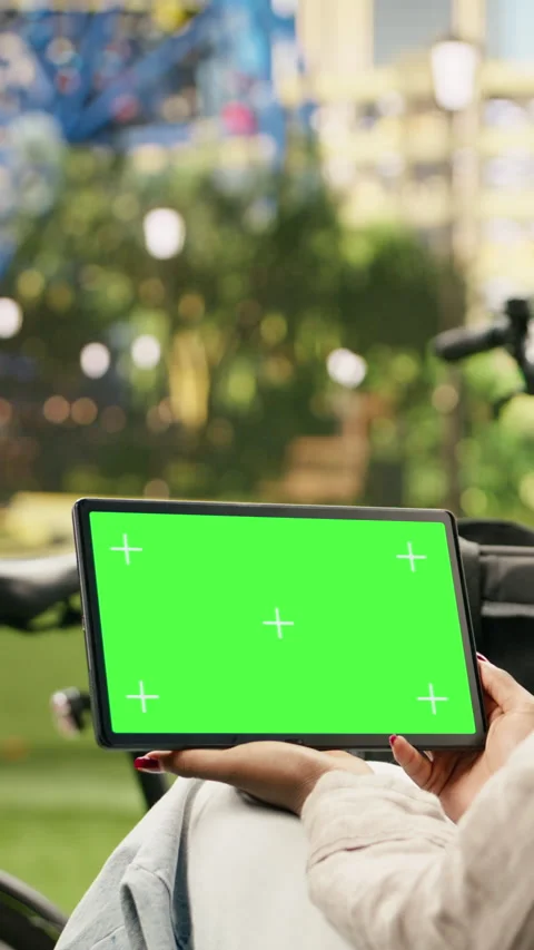 Vertical Video Green screen isolated mockup on tablet held by delivery courier Stock Footage 344380022