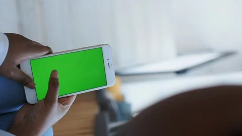 Vertical video. Green Screen or Chroma key Tracking Display on Cellular Stock Footage 121101910
