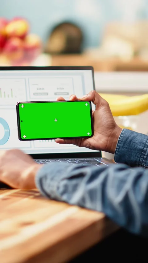 Vertical Video Green screen on phone with professional working remotely Stock Footage 344531219